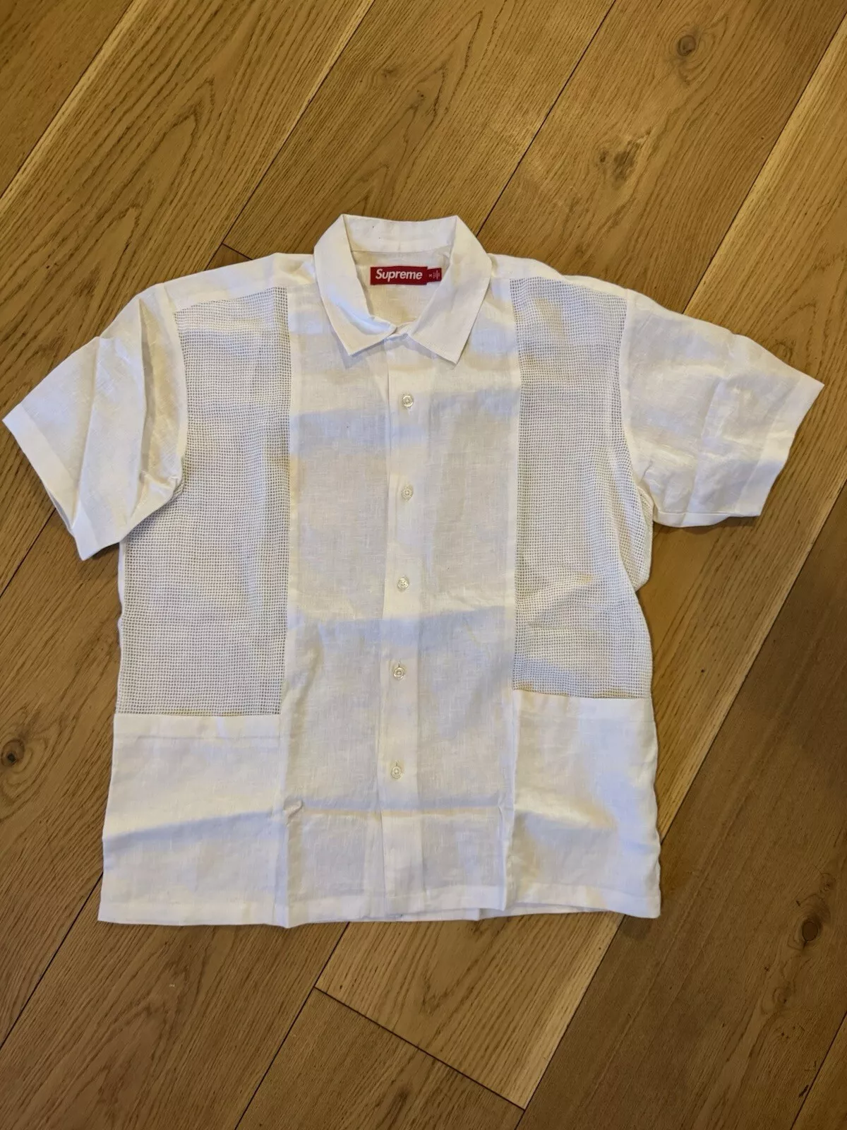 Chemise en lin blanc manches courtes panneau maille suprême 