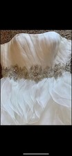 White wedding dress with crystal waist design. Size 8. Very Nice!