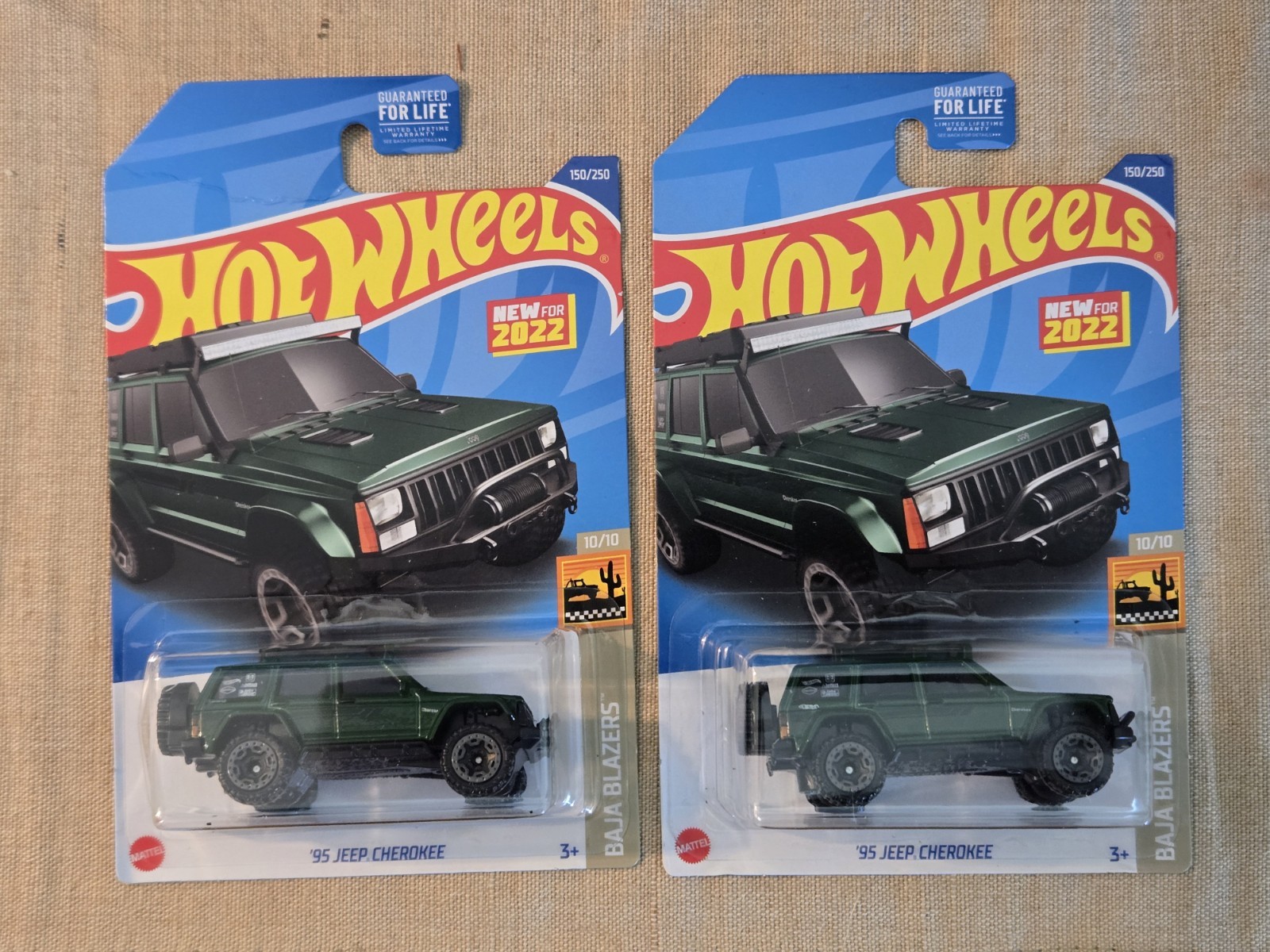 (2) Hot Wheels 2022 Baja Blazers Green ‘95 Jeep Cherokee #150 A21 Sealed Box XJ
