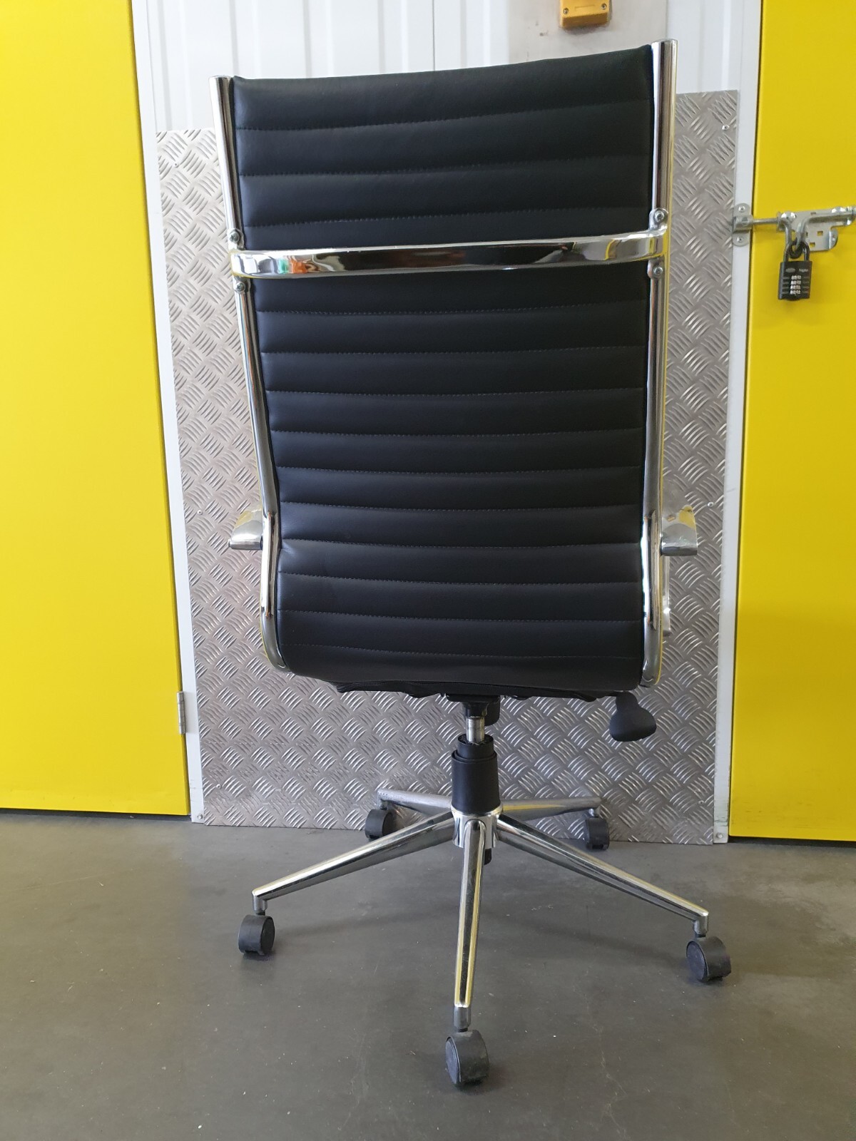 Pair of Black Genuine Leather Office Chairs In Eames Style Chrome on