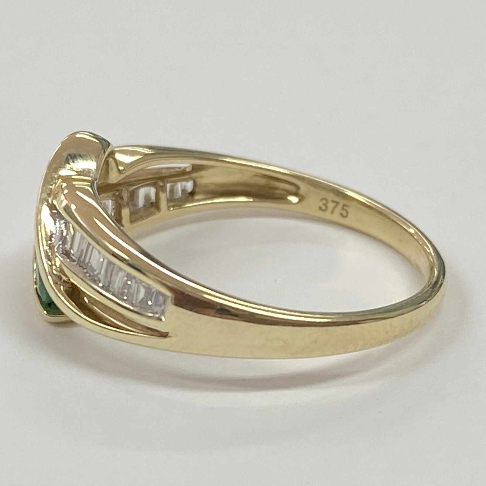 9ct YELLOW GOLD CROSSOVER EMERALD & DIAMOND RING VALUED 1699 eBay