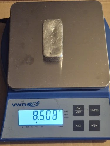 8.5 Oz silver bar home refined and poured  92.5 percent or better