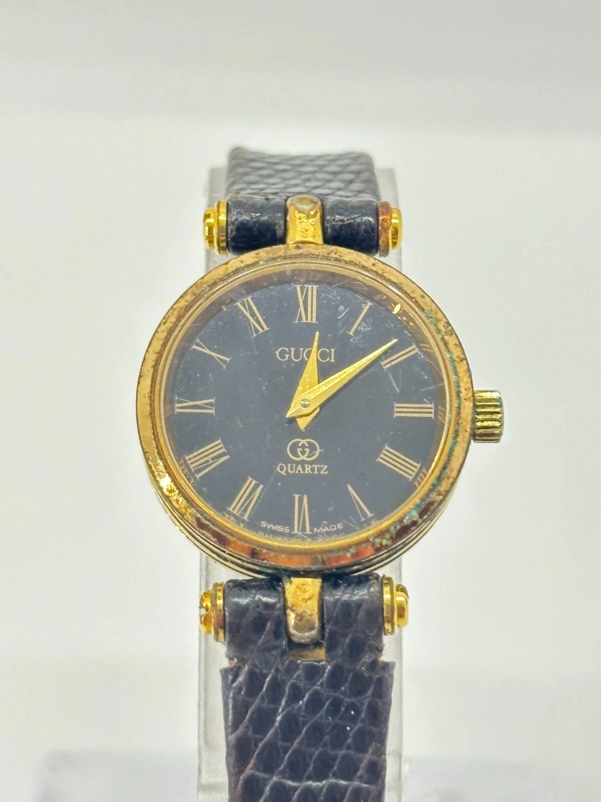 Montre femme Gucci 2000L romaine or noir quartz occasion fonctionne