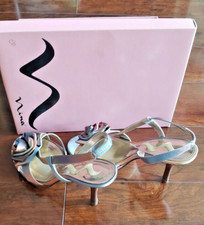Nina satin stilettos size 7. Gold insole, pink/blue/taupe straps w/ rose detail