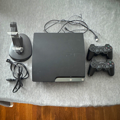 Sony PlayStation 3 Slim 160GB with 2 Controllers and Charging Station