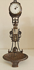 Unusual swinging Mantel Clock