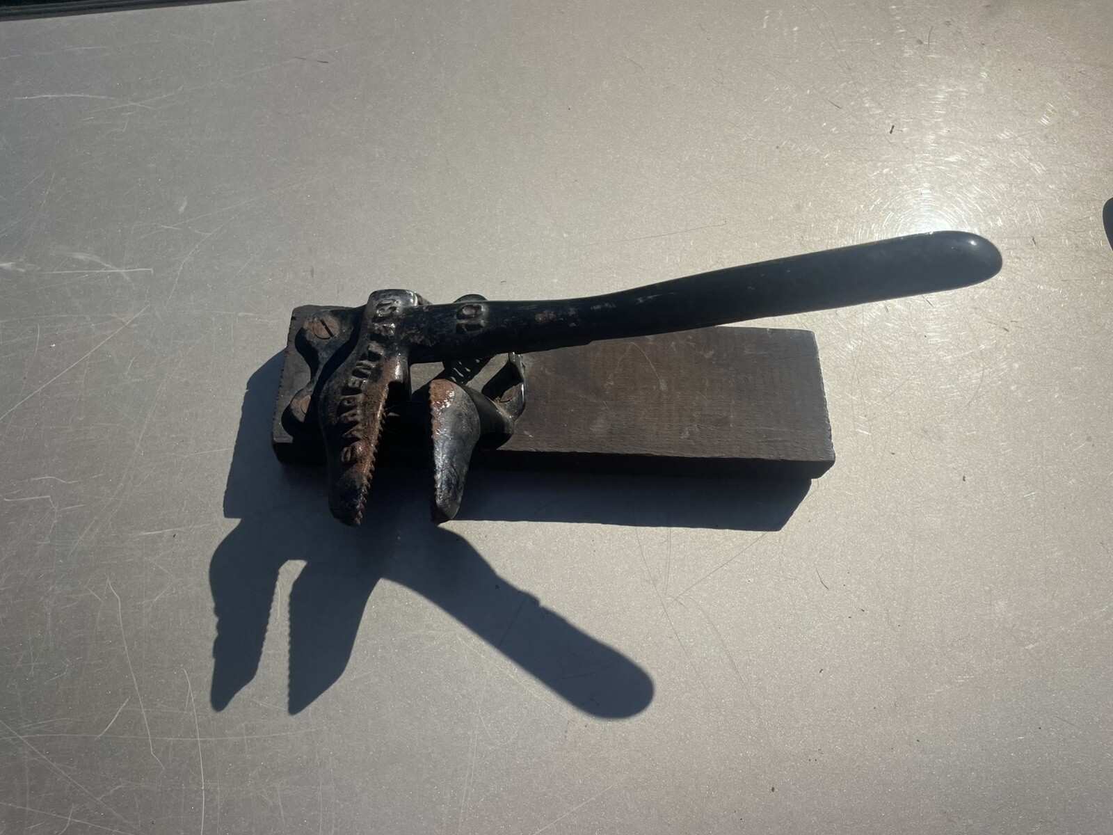 ANTIQUE CAST IRON SARGENT & CO. NO. 10 BRAND NUTCRACKER ATTACHED TO WOODEN BOARD