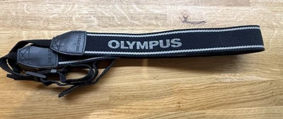 Olympus Black Camera Neck Strap With White Text For SLR Or DSLR Well Used - Image 1 of 3