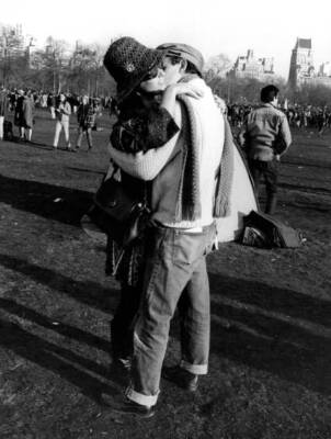 Couple share an intimate moment amongst 10 000 young people who have- Old Photo