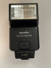 Minolta Auto 320X Flash W/BATTERIES - WORKING