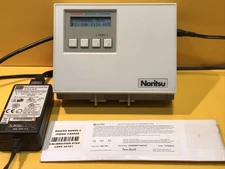 NORITSU Branded X-RITE 891 Densitometer w/Power Supply and Calibration Strip