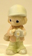 PRECIOUS MOMENTS FOCUSING IN ON THOSE PRECIOUS MOMENTS FIGURINE