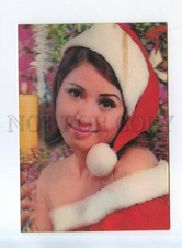 529200 Winking girl in Santa Claus costume lenticular 3D postcard