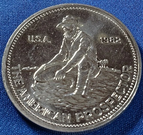 A 1982 Engelhard The American Prospector 1 Troy Ounce .999+ Fine Silver Round