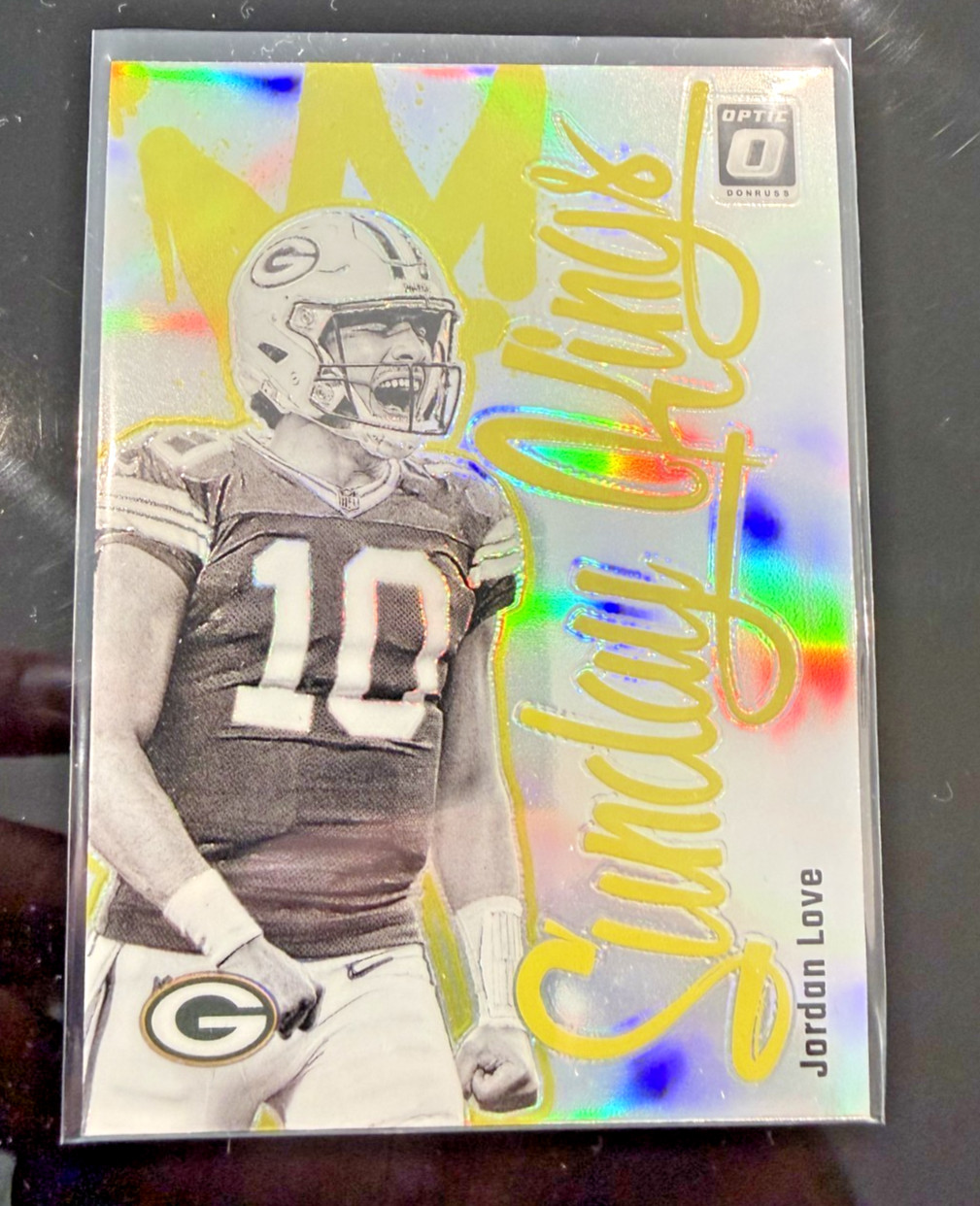 Jordan Love #9 (Football Cards 2024 Panini Donruss Optic Sunday Kings) — is it worth grading?