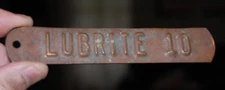 RARE VINTAGE LUBRITE 10 OIL GAS PUMP METAL EMBOSSED ADVERTISING TAG SIGN