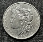 1902-P Better Date MORGAN SILVER DOLLAR. Our Opinion is AU.