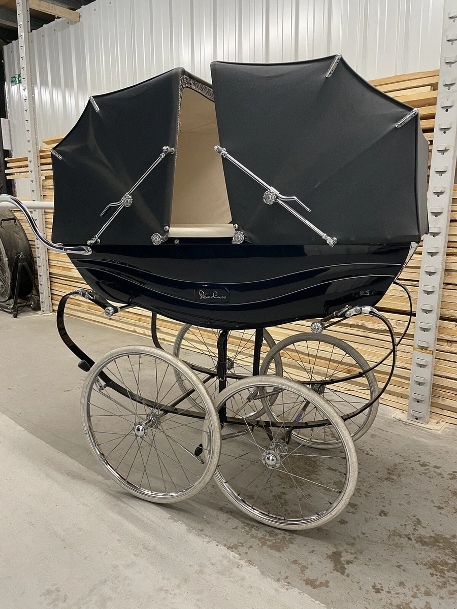 Second hand silver top cross coach built prams