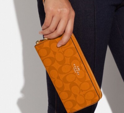 NWT Coach Long Zip Around Wallet Light Orange Signature Canvas