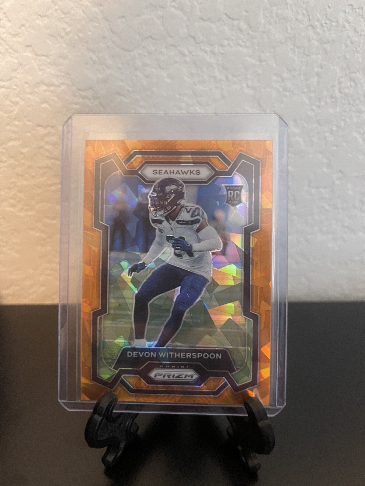 2023 Panini Prizm - Rookies Orange Ice Prizm #389 Devon Witherspoon (RC)