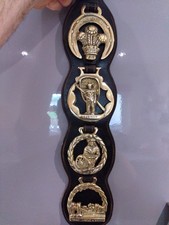 4 Vintage Horse Brasses on a Leather Strap