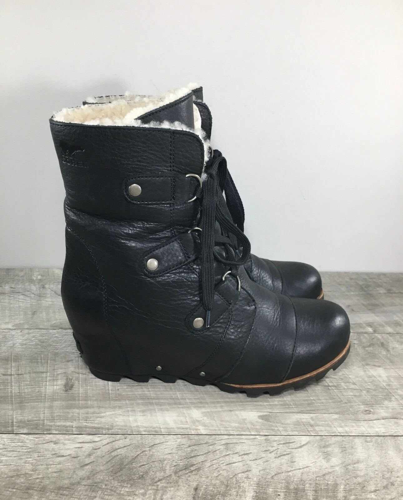 sorel joan of arctic wedge mid shearling lace up boots