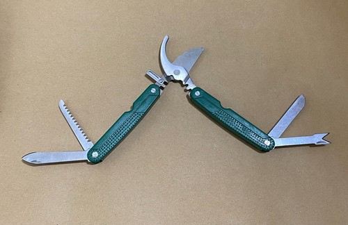 Green Multi-Tool Knife with sheath.