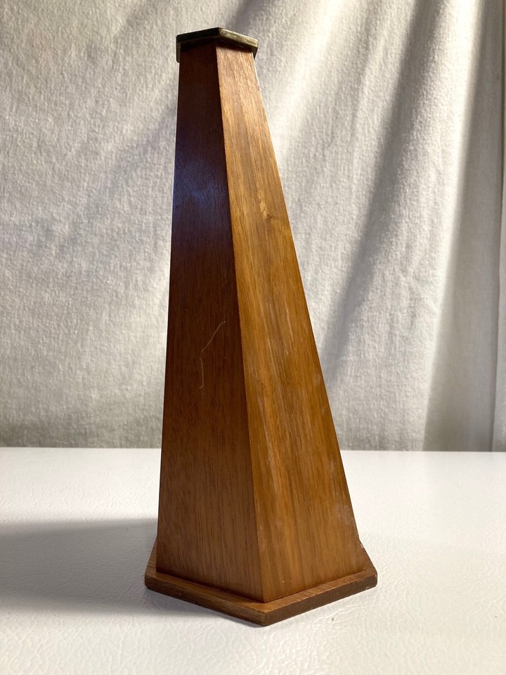 Van Cort's premium hexagonal wooden-and-brass kaleidoscope — the wood body makes it feel more like a fine instrument than a toy.