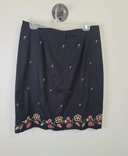 Embroidered black skirt, floral, annex