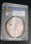 1986 PCGS MS68 Silver Eagle Electric Blue Magenta Toning TrueView 1st Year ASE