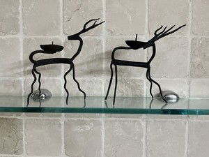 A NEW pair of handcrafted unique reindeer candle holders in black iron 6" Tall