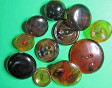 (11) VINTAGE 1/2"-7/8" AMBER BROWN EARLY PLASTIC SHANK 2-& 4-HOLE BUTTONS-U381
