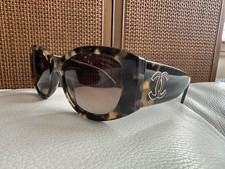 Chanel 5524 oval sunglasses in tortoise and black, brown polarized lenses