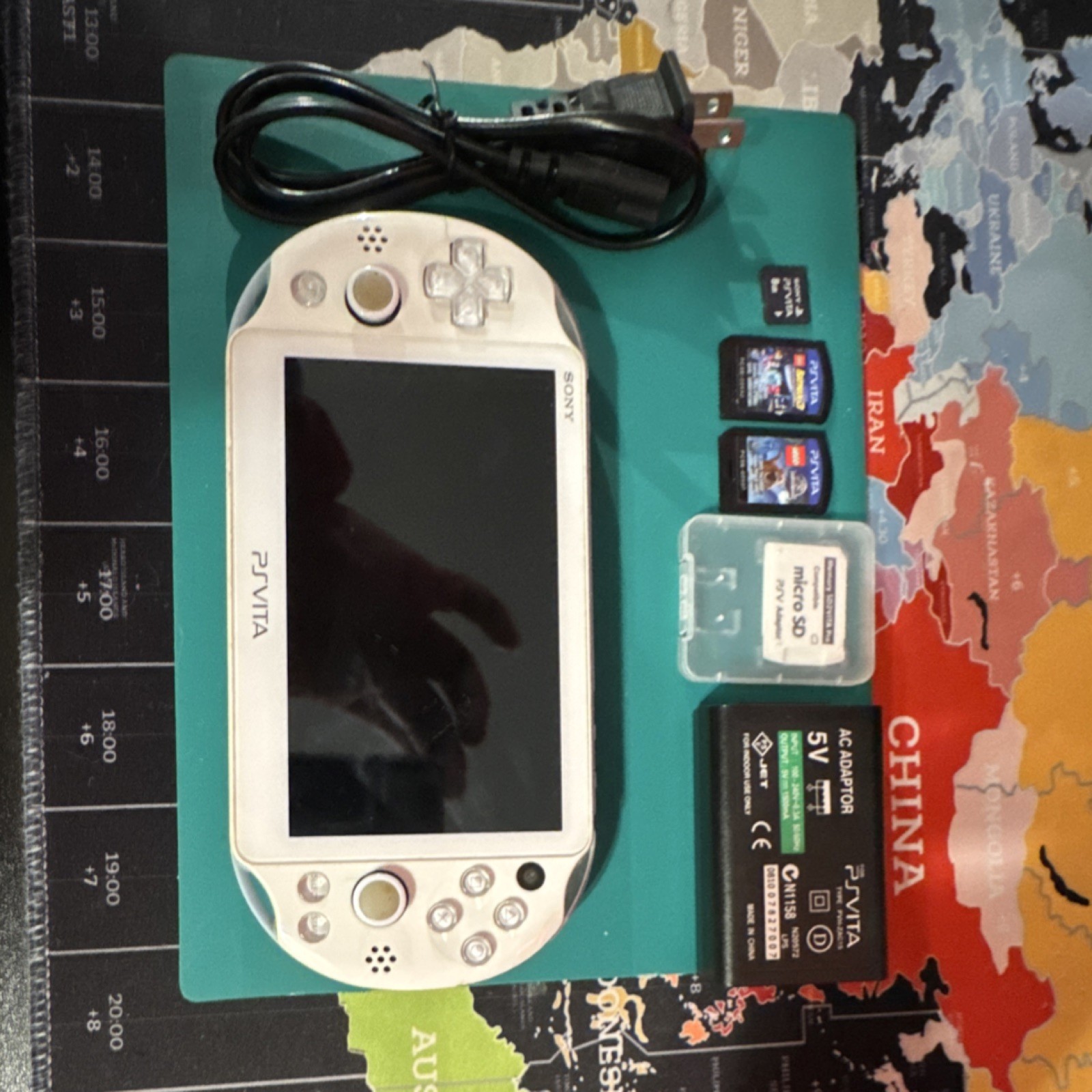 Sony PS Vita White Light Blue Handheld Wi-Fi Touchscreen w/ Charger & Cards