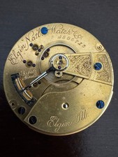 VINTAGE 18 SIZE ELGIN GILT POCKET WATCH MOVEMENT GR. 76 KEEPING TIME 15 JEWEL