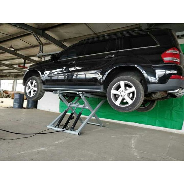 small portable scissor car lift for home garage load
