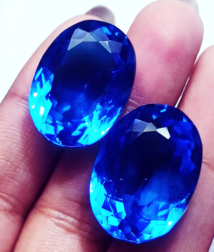 2 Piezas Piedras Preciosas Sueltas Color Azul Topacio Total 83.60 Ct Forma Ovalada Certificado