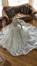 European Princess Wedding Gown.  Size 8-12.  Corset Tie. Beautiful Long Train
