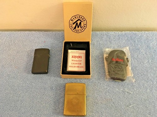 3 ZIPPO LIGHTERS LOT BRASS MARLBORO SLIM BLACK AND ONE BRAND NEW UNFIRED READ