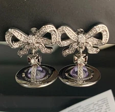 Vivienne Westwood Drop Ribbon Orb Earrings Silver Purple with drawstring