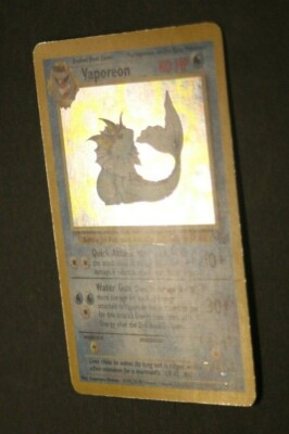 Vaporeon 12/64 1999 Vintage Pokemon Holographic Shiny Foil Holo