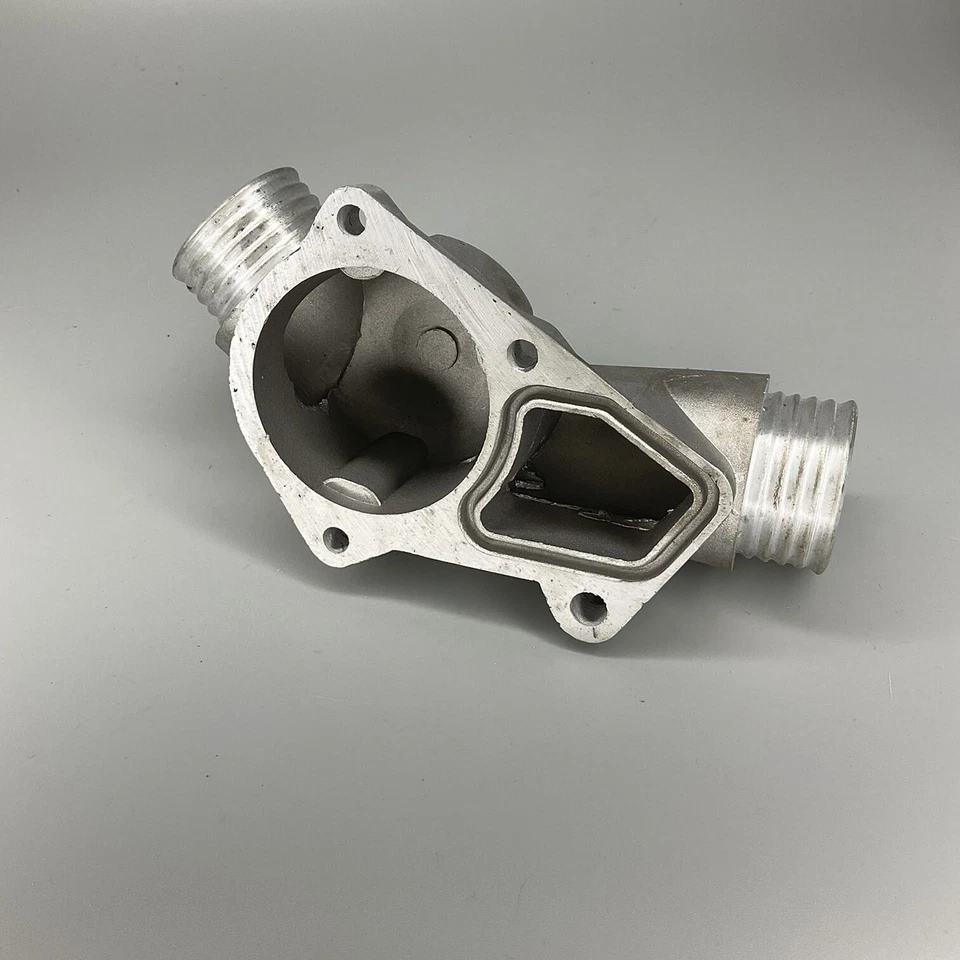 Carcasa termostato original original para BMW 323i 325i 328i 525i M3 Z3 11531722531 Foto 2 de 4