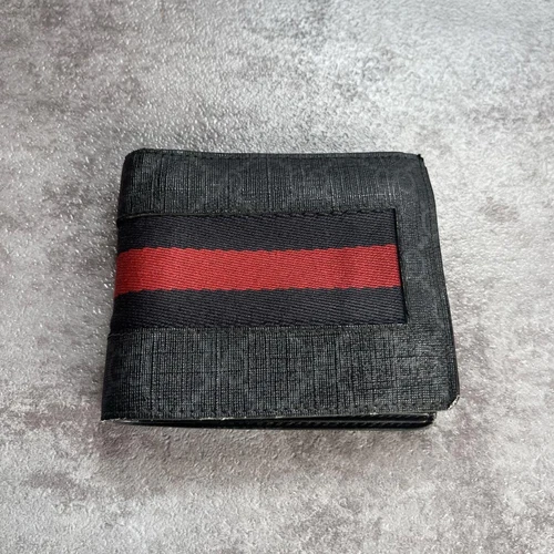 Portefeuille Gucci GG Supreme bi pliable noir ligne sherry occasion