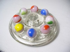  916 Vintage Marble King Rainbows 8 Pieces all are on a Pink base.