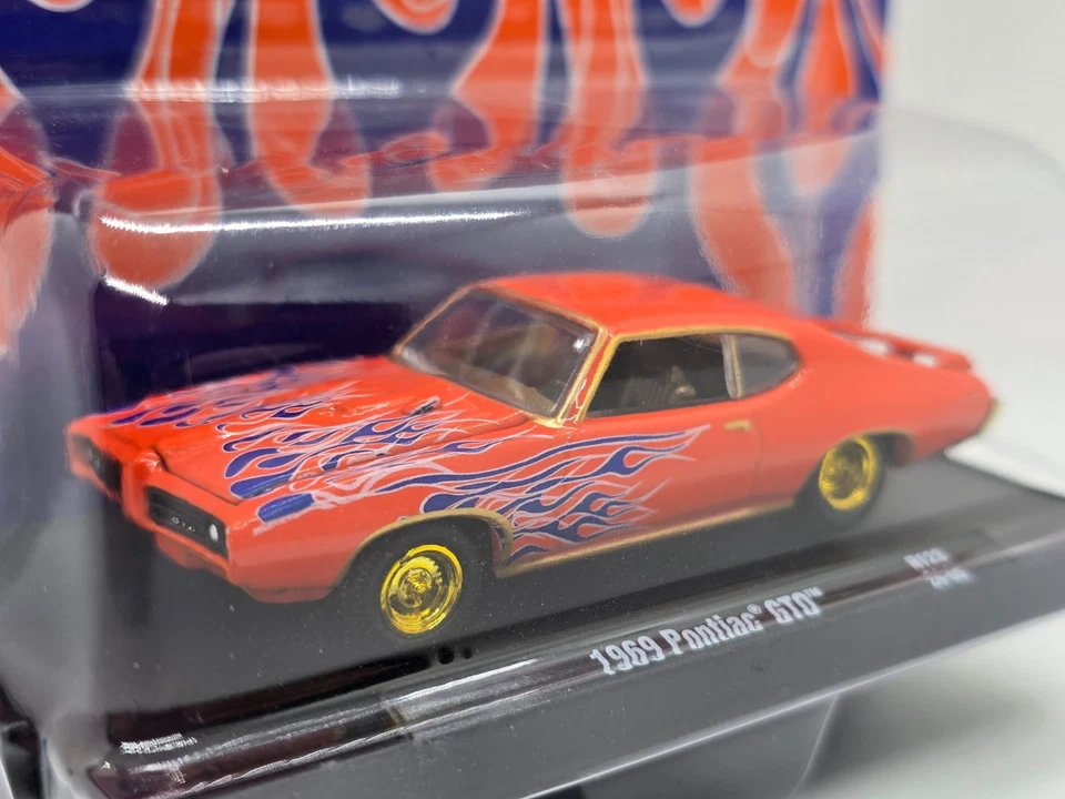 2025 M2 Machines Drivers Orange Blue Flames 1969 Pontiac GTO Chase R123 24-69 - Image 3 of 4