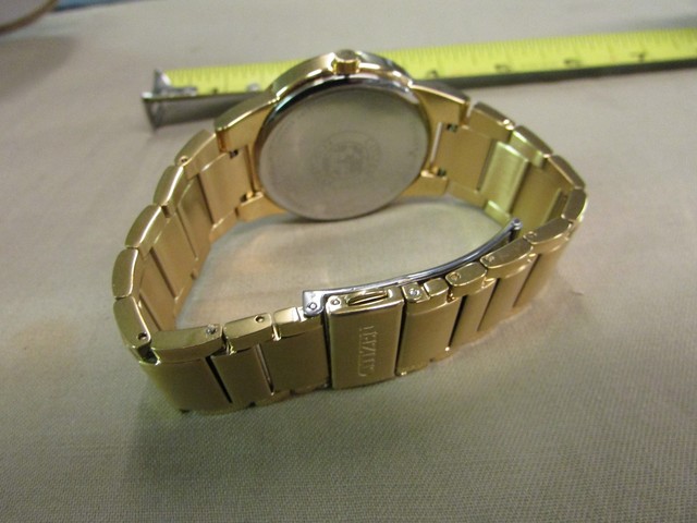 citizen eco drive j165 gold