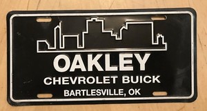 OAKLEY CHEVROLET BUICK CAR DEALER FRONT BOOSTER LICENSE PLATE