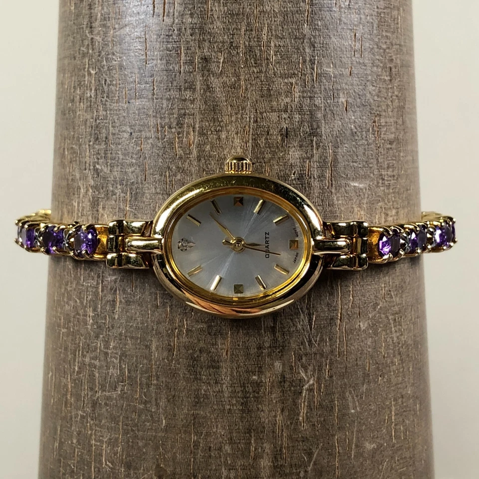 Reloj de cuarzo ovalado pulsera piedra cristal granate Avon para mujer F69273-1/P 7 1/4" Foto 2 de 4