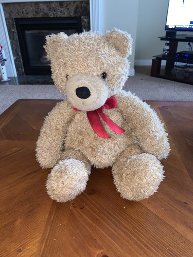 red ribbon bow plush stuffed animal toy 