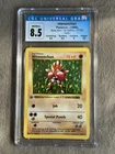 Pokemon 1999 Hitmonchan Base Set Shadowless 1st Edition 7/102 CGC 8.5 NM/Mint